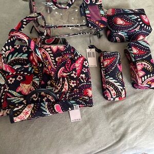 Vera Bradley Paisley Cosmetic Bag comes with all items that are included in main